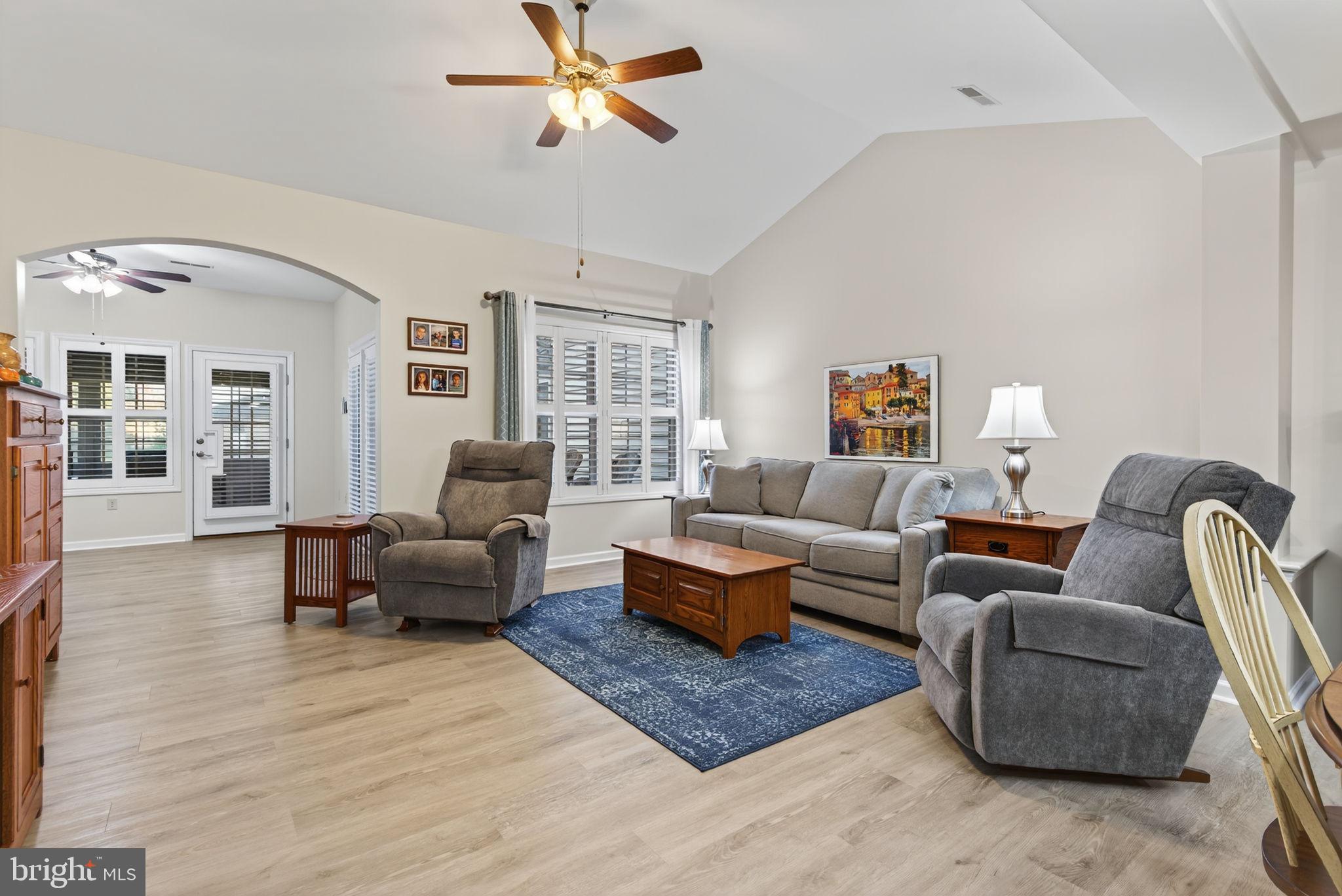 1334 Woodcrest Court Mount Joy, PA 17552 - Photo 14 of 37 a living room with furniture and a wooden floor