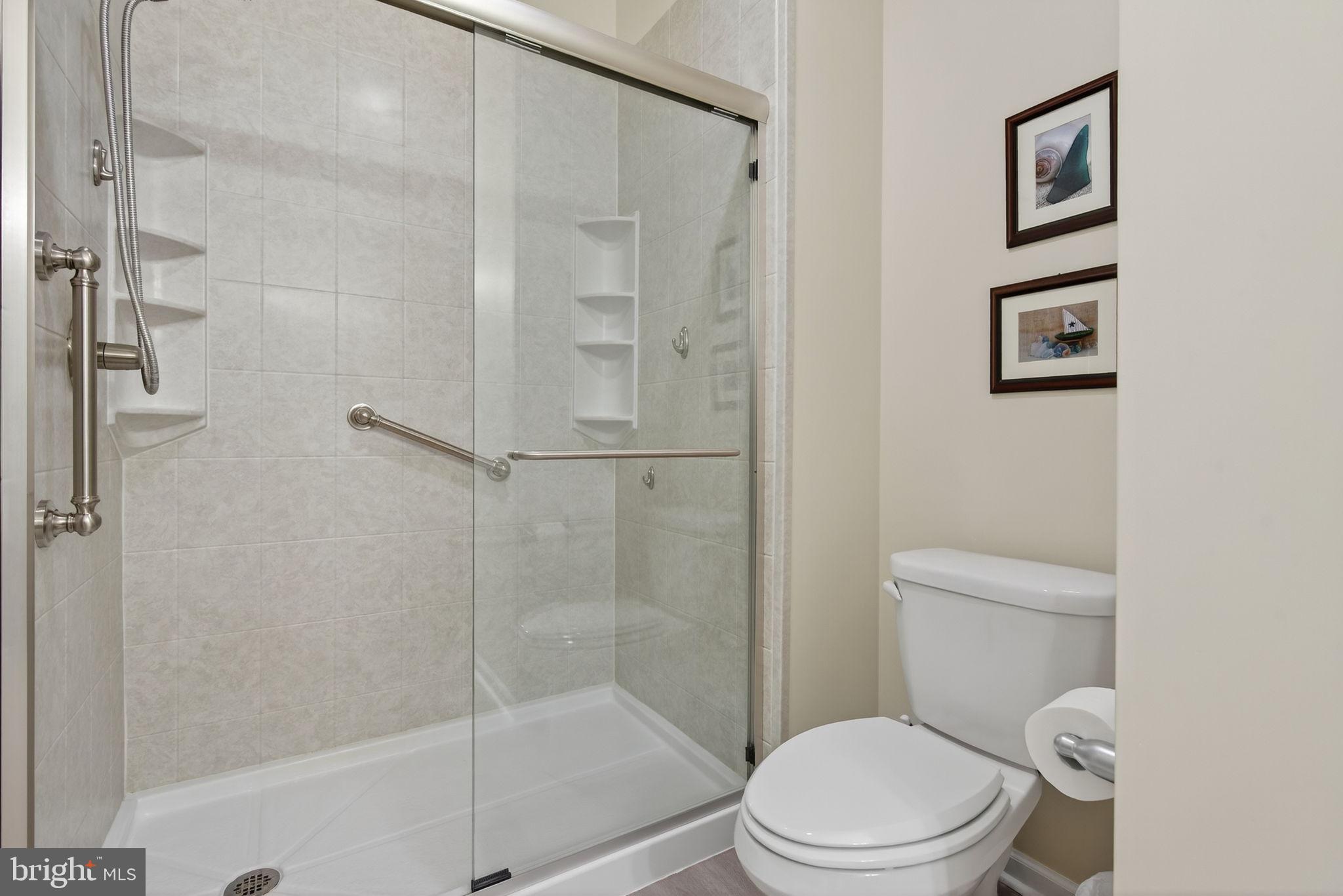 1334 Woodcrest Court Mount Joy, PA 17552 - Photo 19 of 37 a white toilet next to a bathroom sink