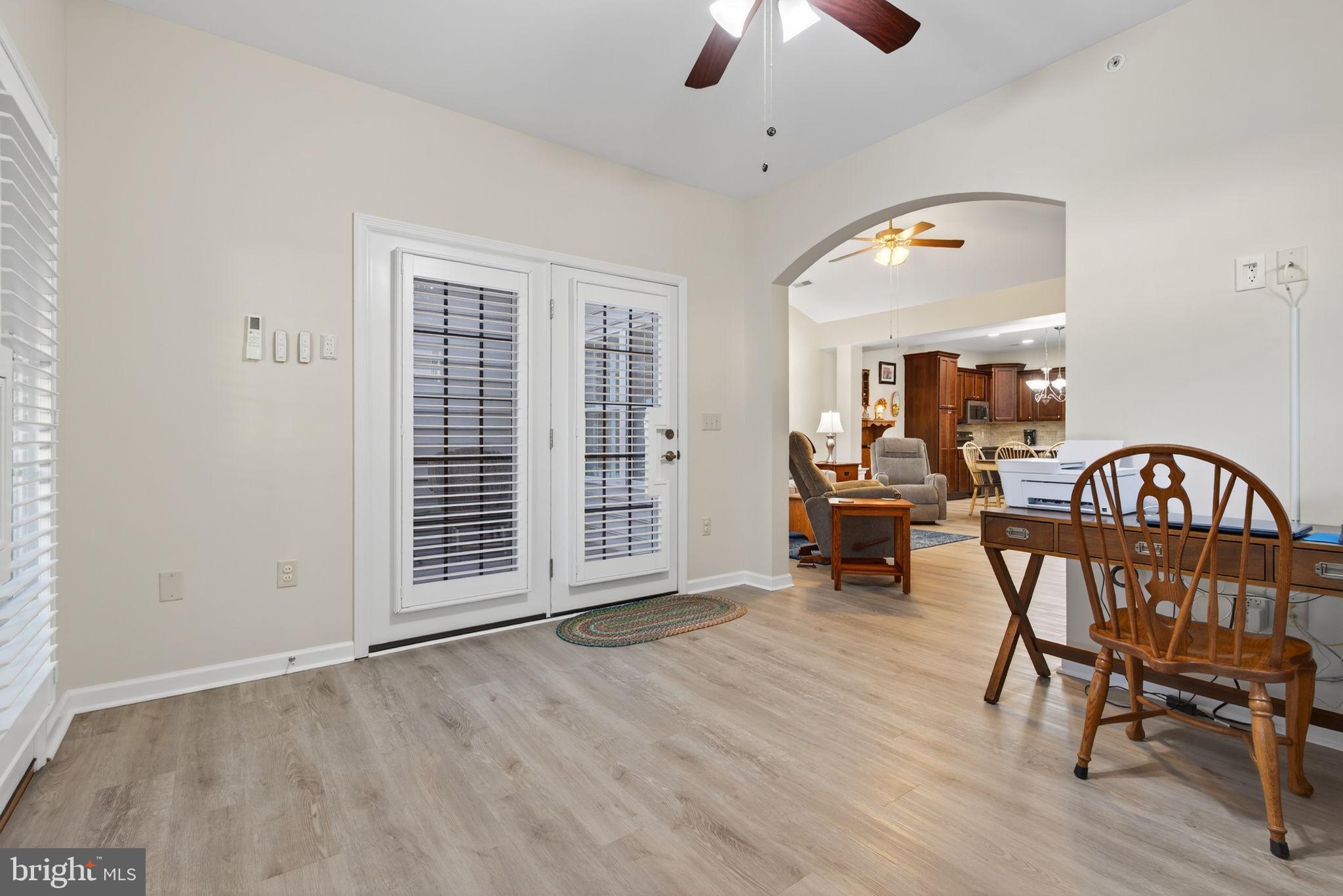 1334 Woodcrest Court Mount Joy, PA 17552 - Photo 21 of 37 an entryway with a dining room and livingroom with furniture wooden floor a chandelier