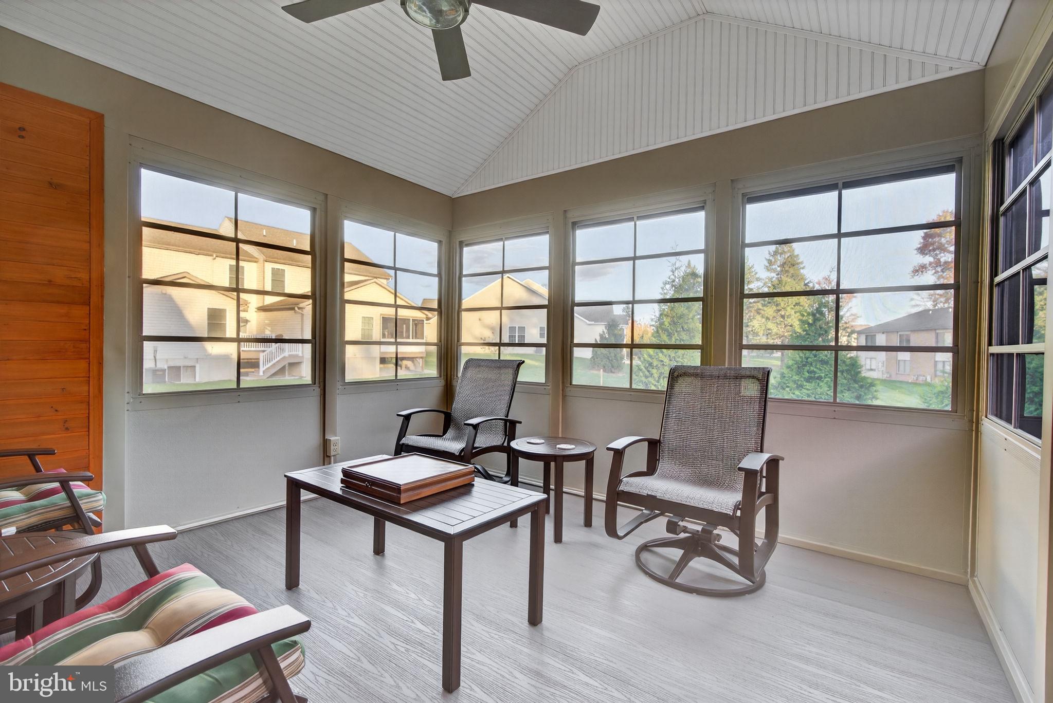 1334 Woodcrest Court Mount Joy, PA 17552 - Photo 22 of 37 a living room with furniture a rug and a large window