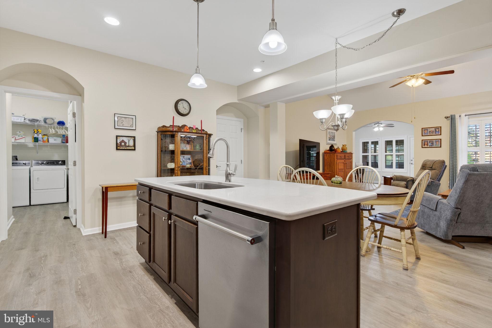 1334 Woodcrest Court Mount Joy, PA 17552 - Photo 10 of 37 an open kitchen with a table and chairs in it