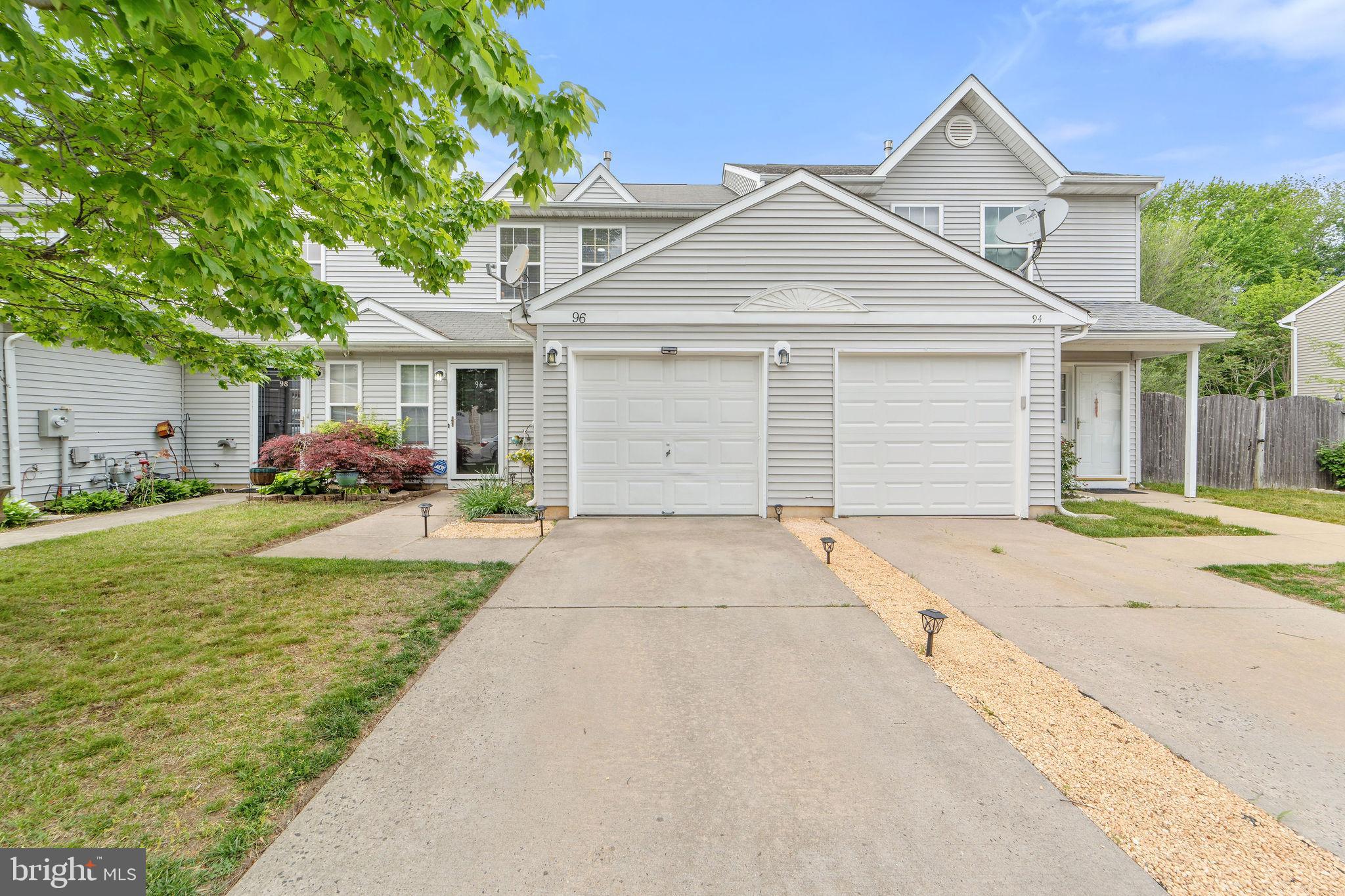 96 High Meadows Drive Sicklerville, NJ 08081 - Photo 2 of 20 a front view of a house with garden