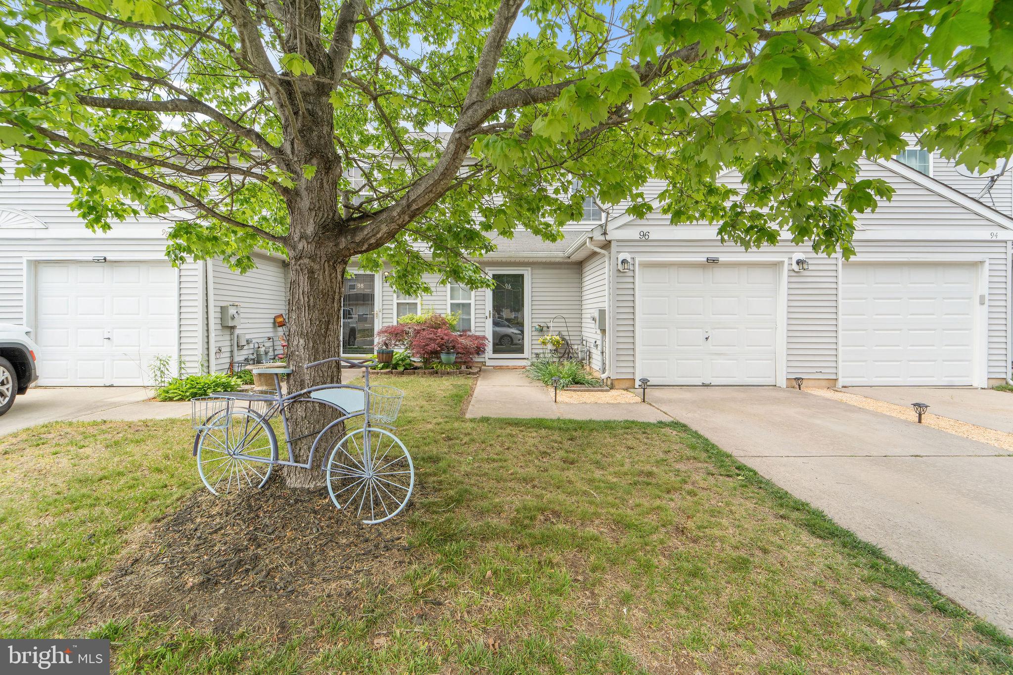 96 High Meadows Drive Sicklerville, NJ 08081 - Photo 4 of 20 a house view with a table and chairs