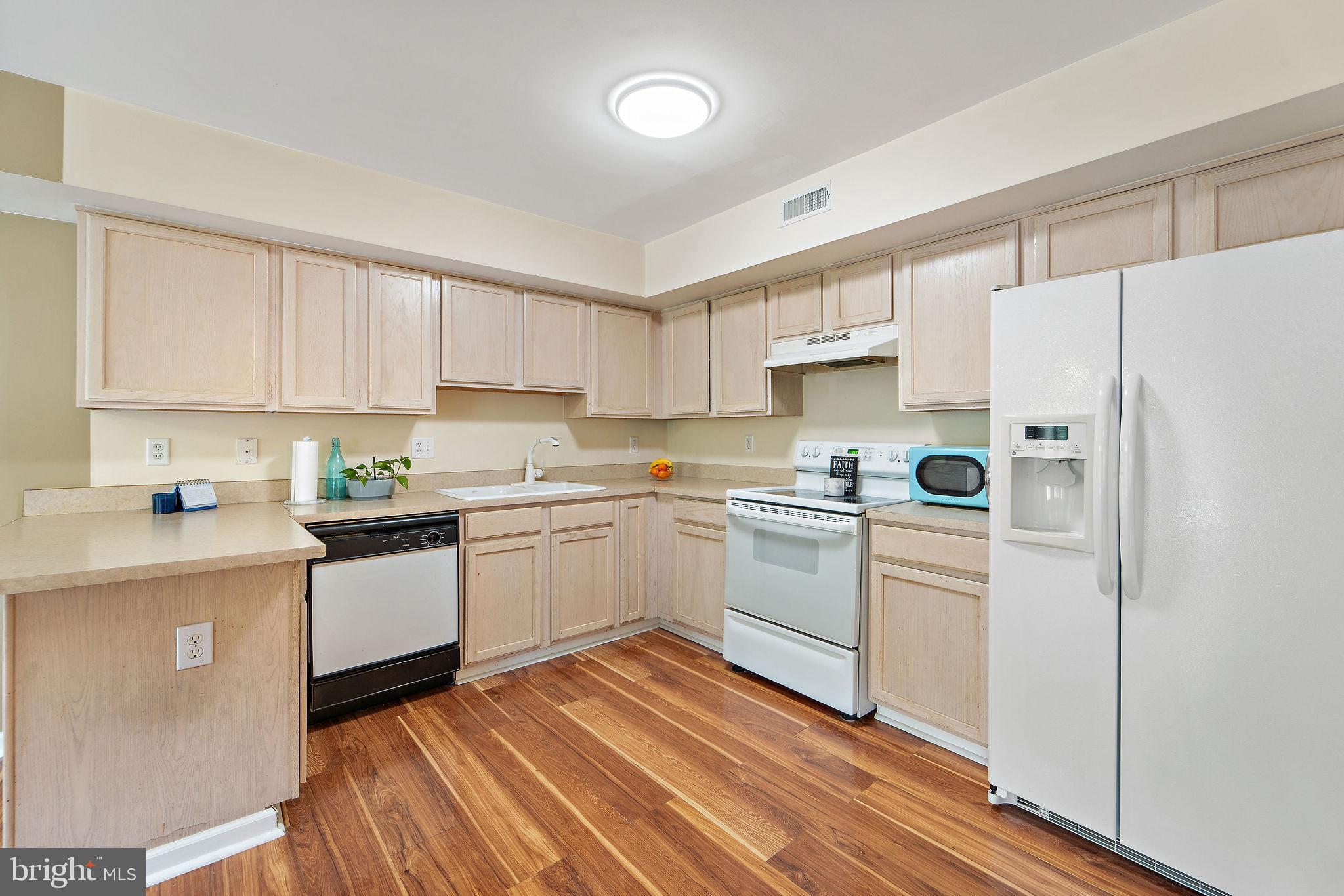96 High Meadows Drive Sicklerville, NJ 08081 - Photo 9 of 20 a kitchen with granite countertop appliances a sink and a refrigerator