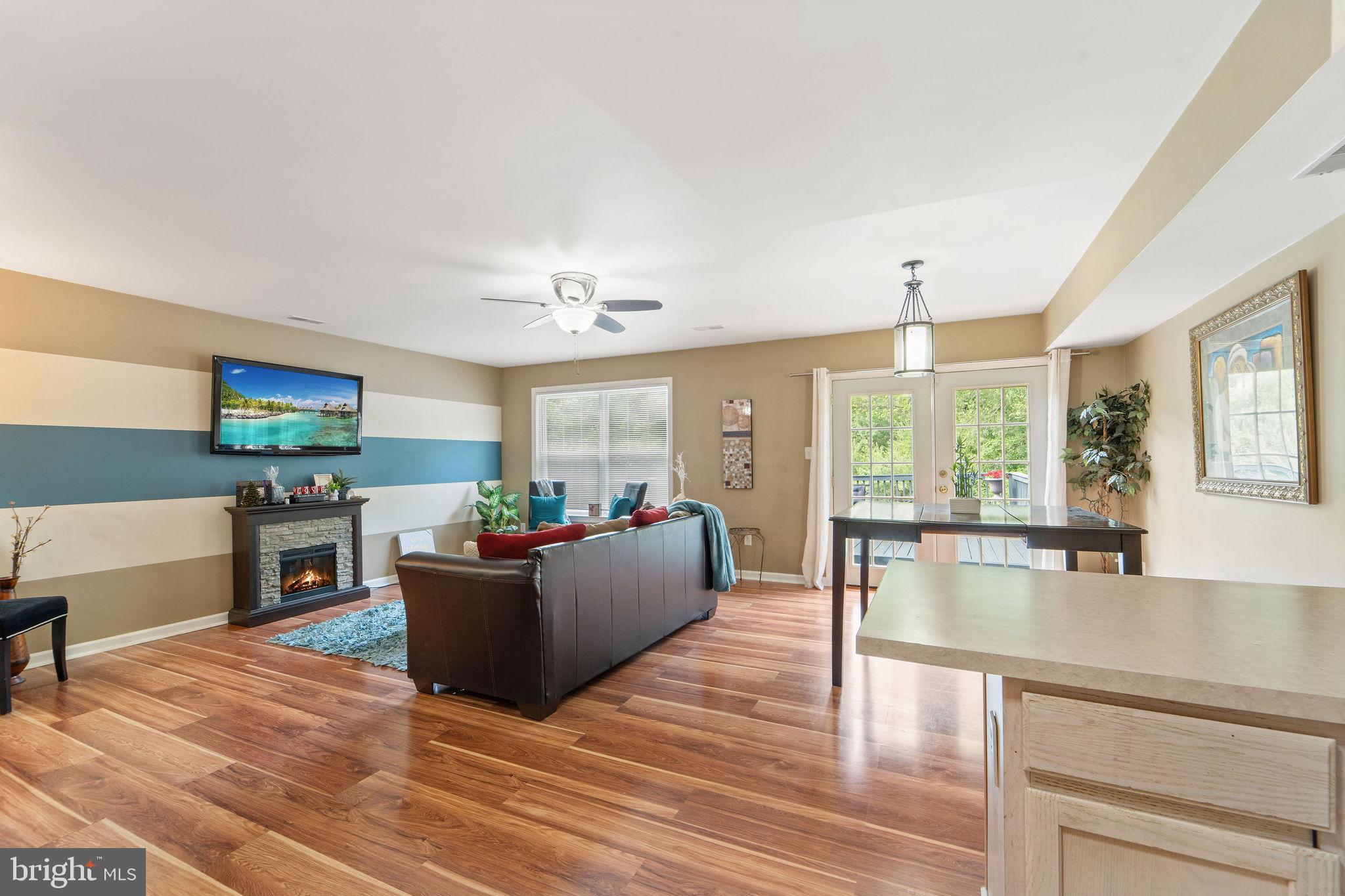 96 High Meadows Drive Sicklerville, NJ 08081 - Photo 10 of 20 a living room with furniture and a flat screen tv