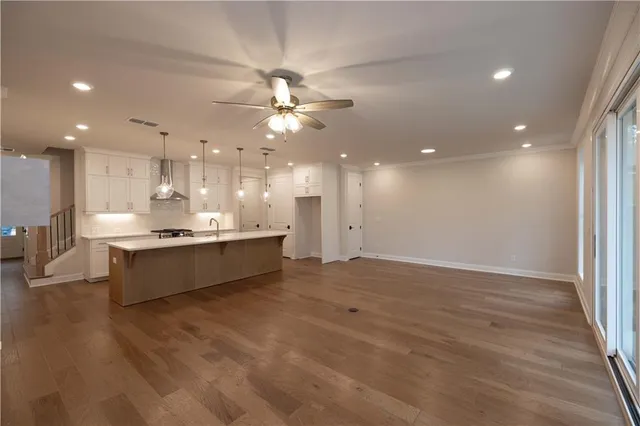 a large bathroom with a large tub and shower