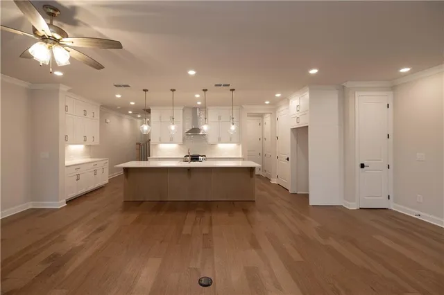 a view of a hallway with staircase