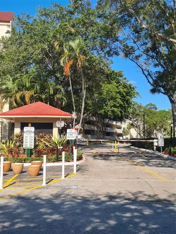 a view of a patio with swimming pool