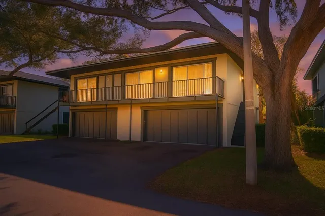 a kitchen with a stove and a refrigerator
