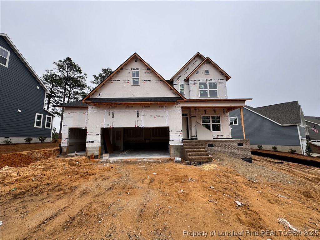 653 Watauga Lane Aberdeen, NC 28315 - Photo 1 of 38 a view of a house with a yard and garage
