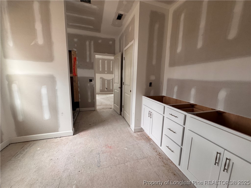 653 Watauga Lane Aberdeen, NC 28315 - Photo 21 of 38 a bathroom with a sink and a shower