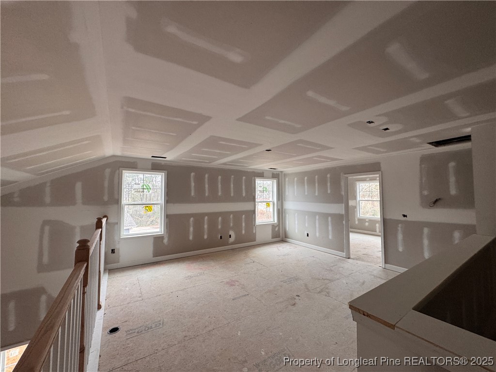 653 Watauga Lane Aberdeen, NC 28315 - Photo 25 of 38 a large bedroom with a large bed and a large window