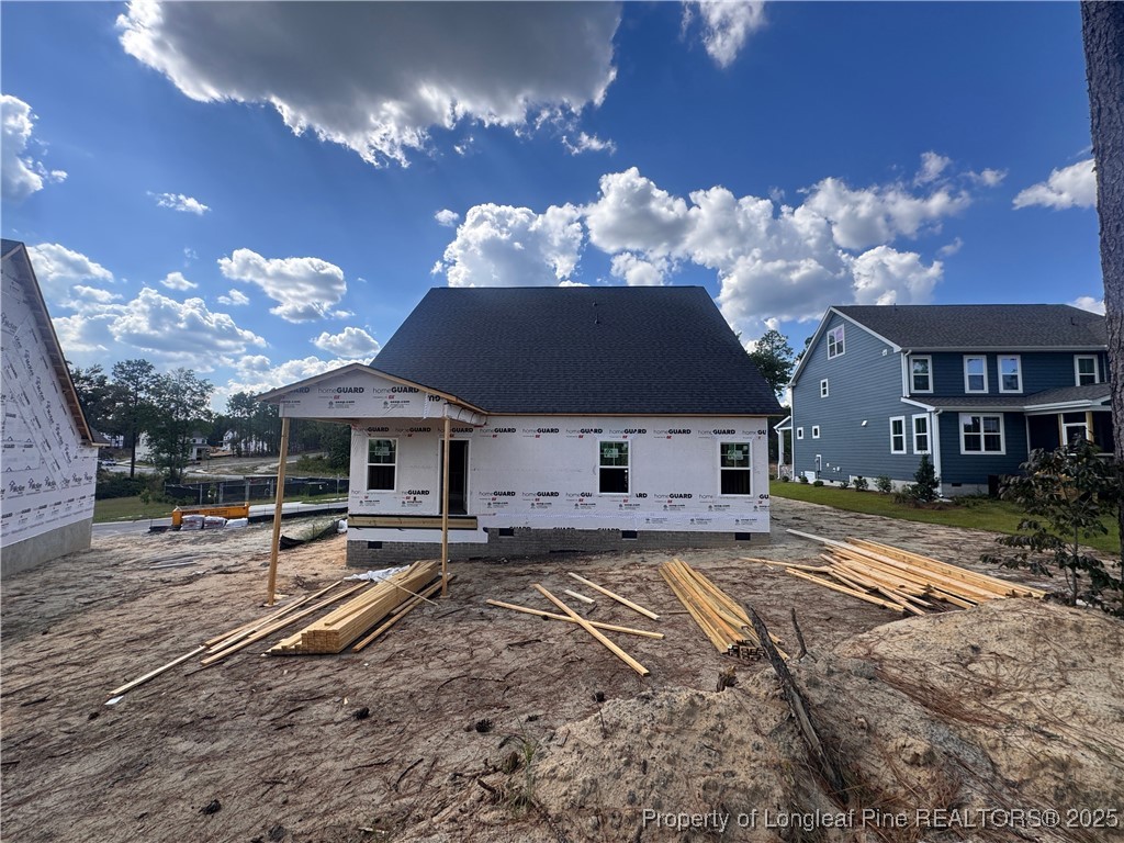 653 Watauga Lane Aberdeen, NC 28315 - Photo 6 of 38 a view of a house with a yard