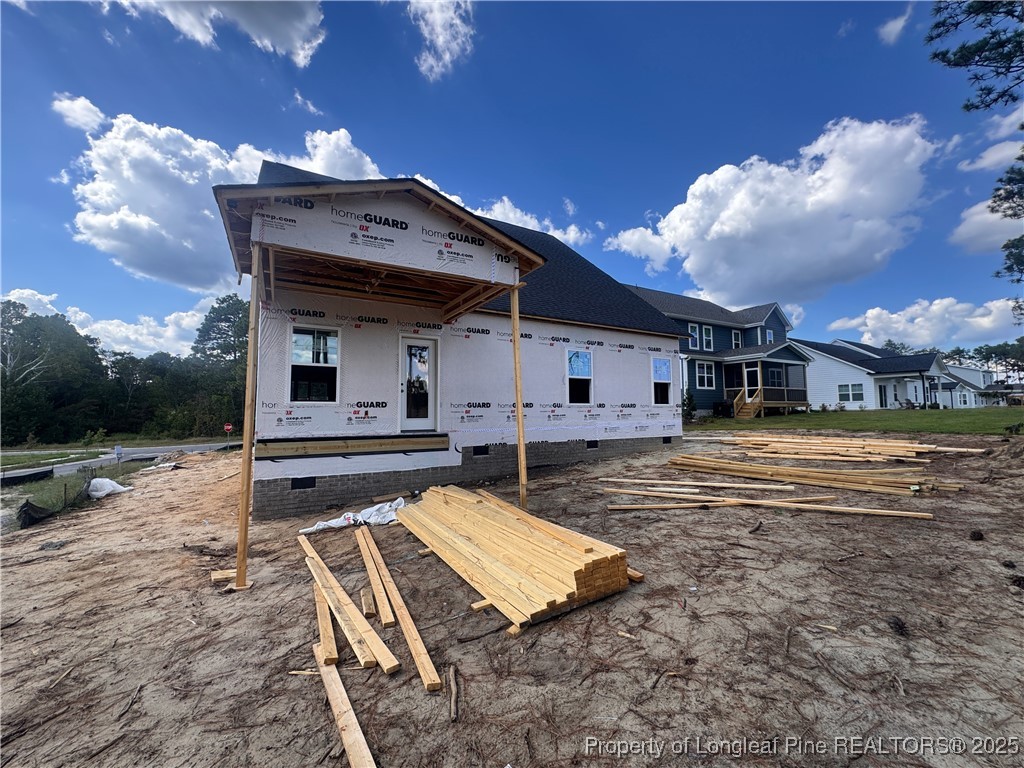 653 Watauga Lane Aberdeen, NC 28315 - Photo 7 of 38 a view of a house with a bed