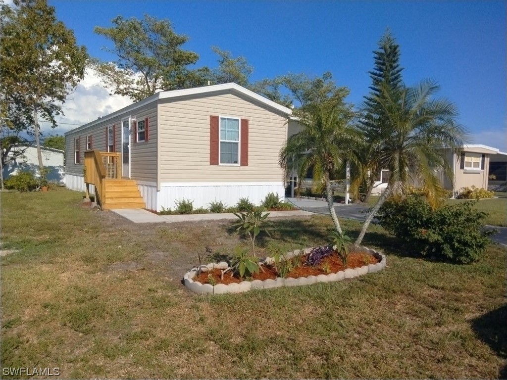 132 Cape Sable Drive Naples, FL 34104 - Photo 2 of 20 a view of a house with backyard
