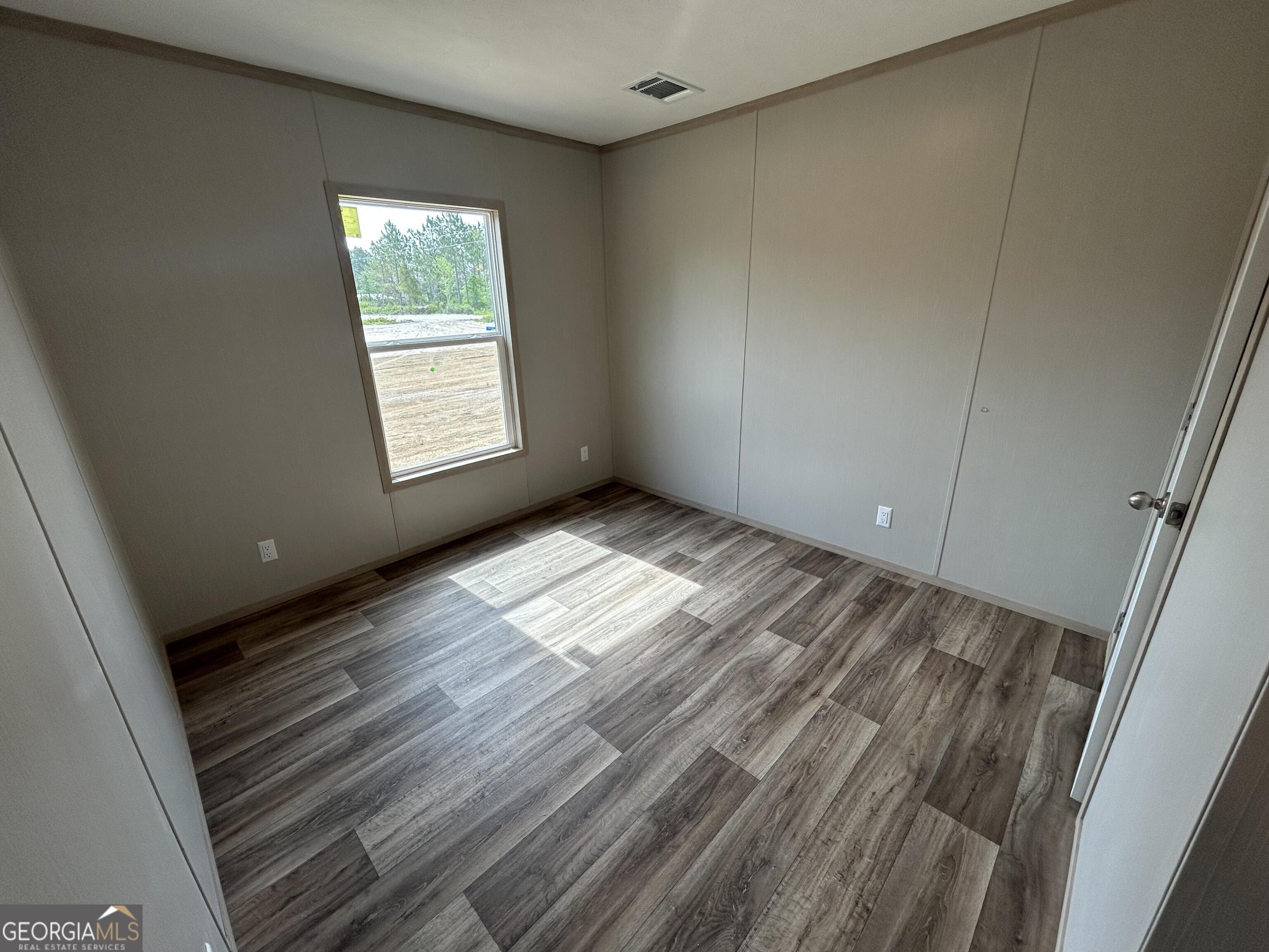640 Elmer Thrift Road Waycross, GA 31503 - Photo 22 of 23 a view of empty room with window