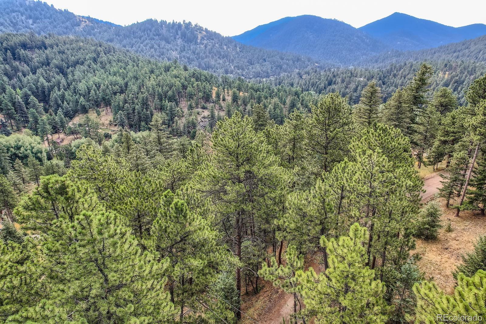 5296 Cherokee Road Indian Hills, CO 80454 - Photo 12 of 26 a view of mountains and valleys