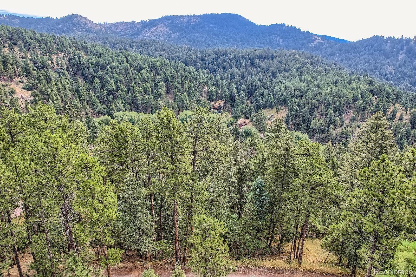 5296 Cherokee Road Indian Hills, CO 80454 - Photo 17 of 26 a view of a and mountain in the distance