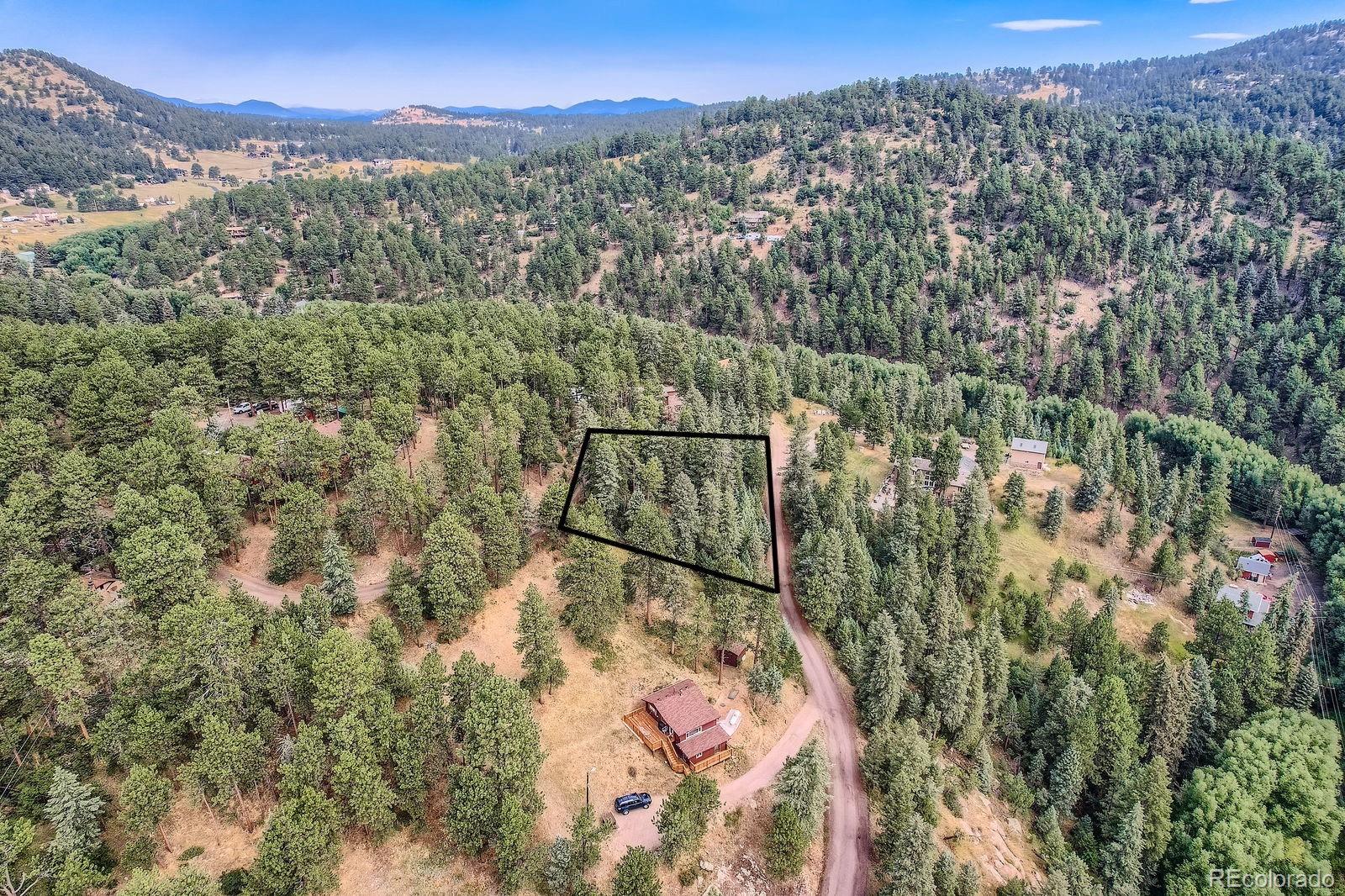 5296 Cherokee Road Indian Hills, CO 80454 - Photo 5 of 26 a view of a city with mountain