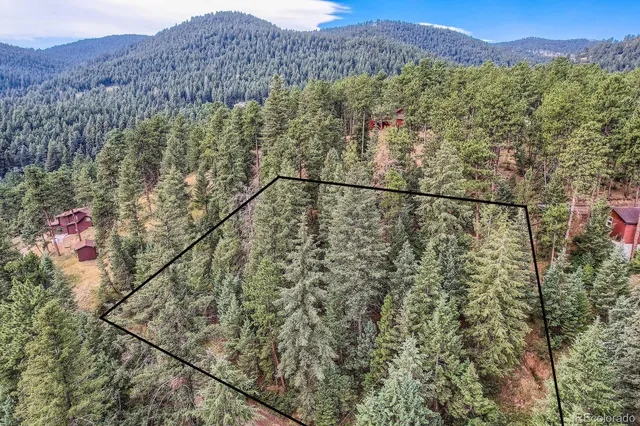 a view of a city with mountain