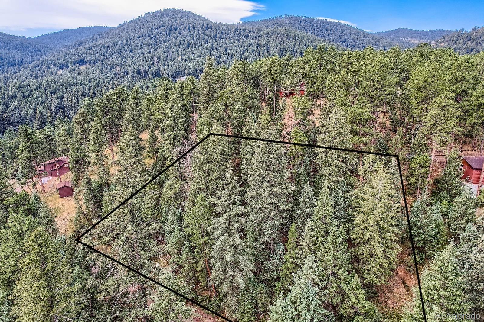 5296 Cherokee Road Indian Hills, CO 80454 - Photo 8 of 26 a view of a city with mountain