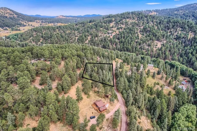 a view of a city with mountain