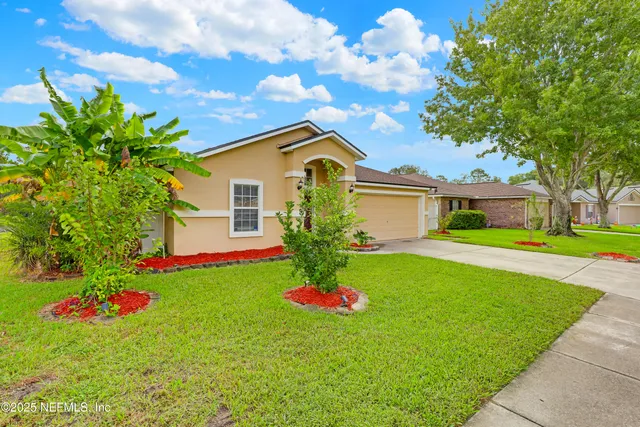 a house view with a garden space
