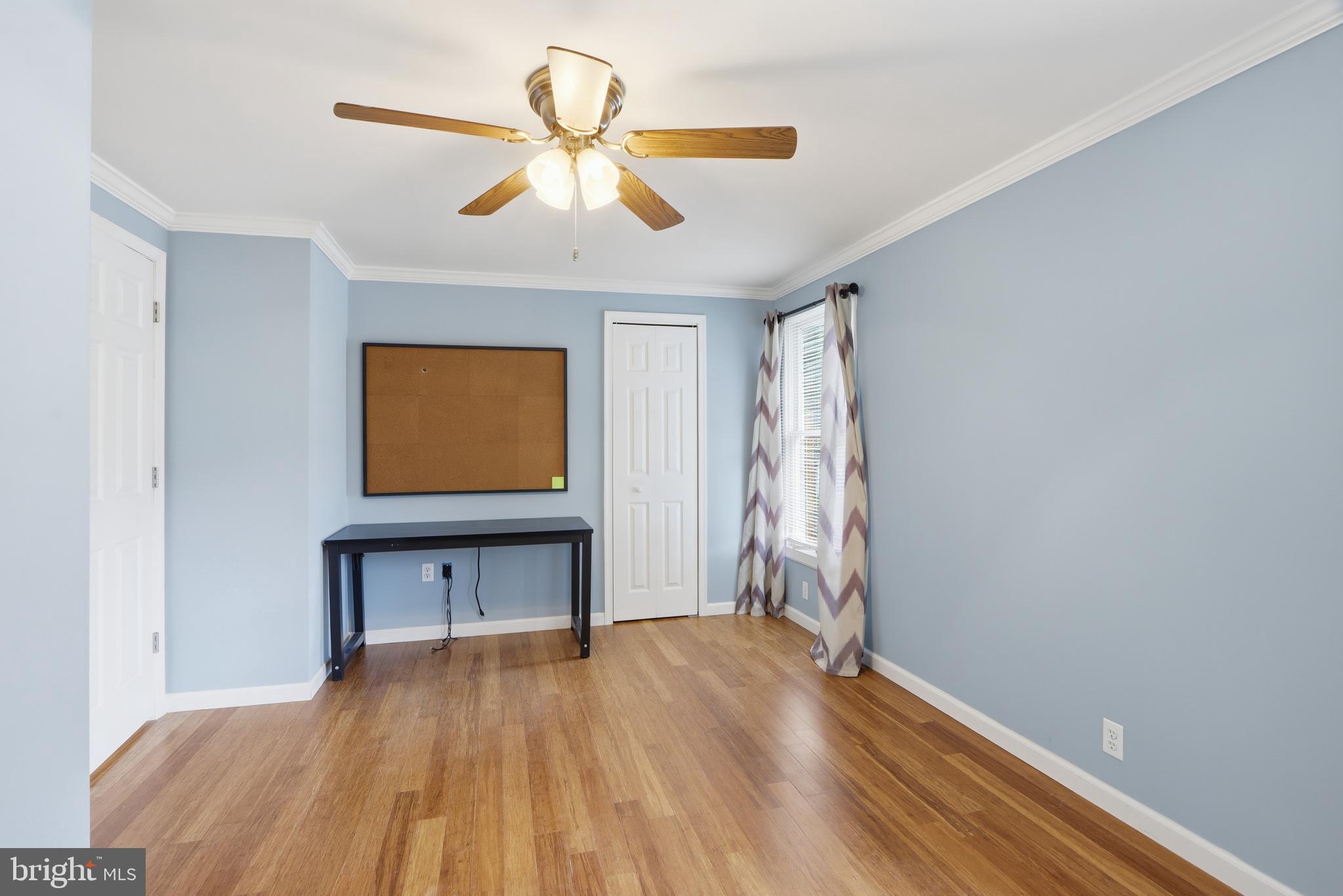 2014 Putnam Road Halethorpe, MD 21227 - Photo 10 of 30 a view of empty room with wooden floor and fan