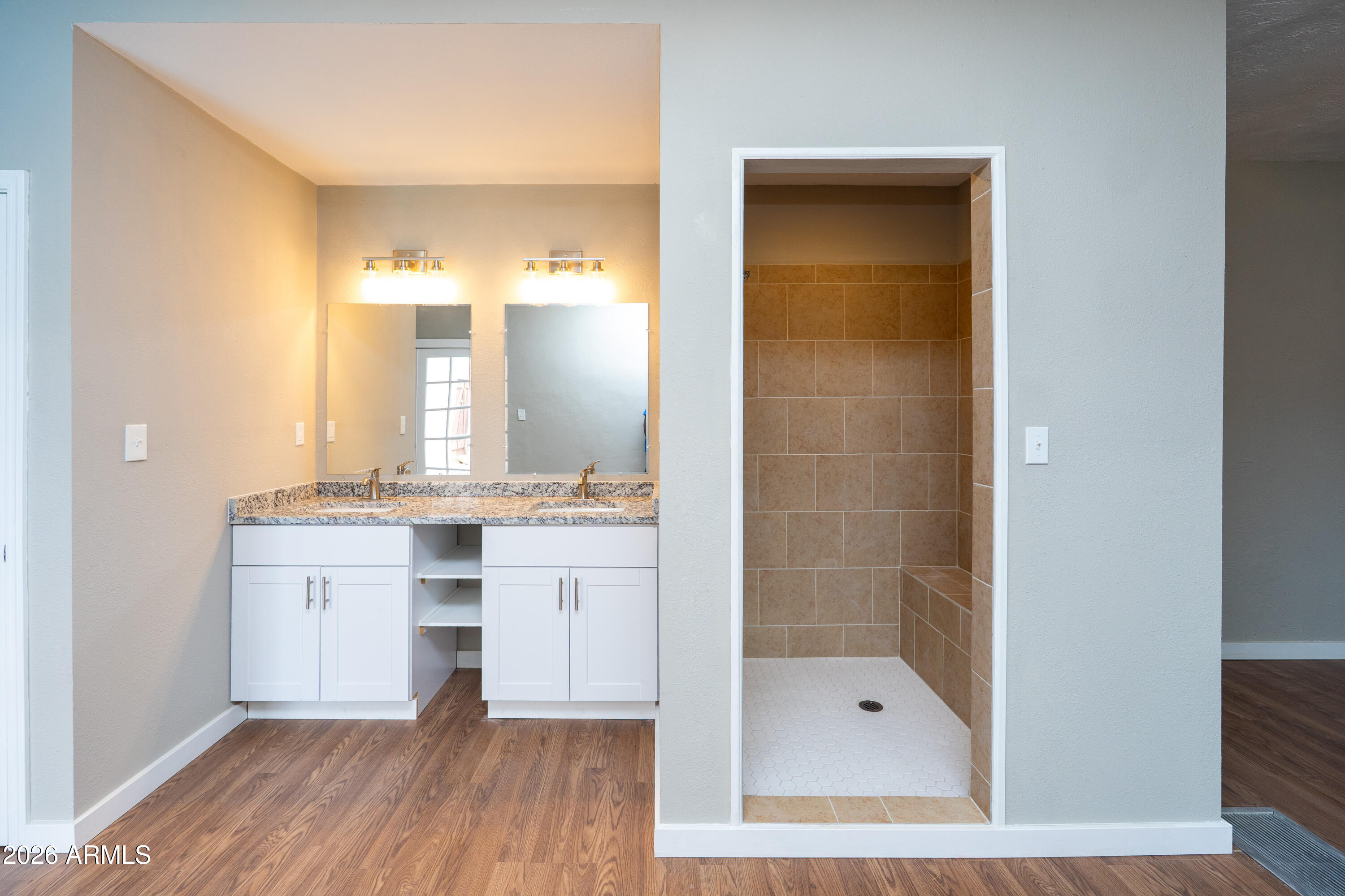 4 Cochise Lane Bisbee, AZ 85603 - Photo 37 of 72 a bathroom with a double vanity sink mirror and shower