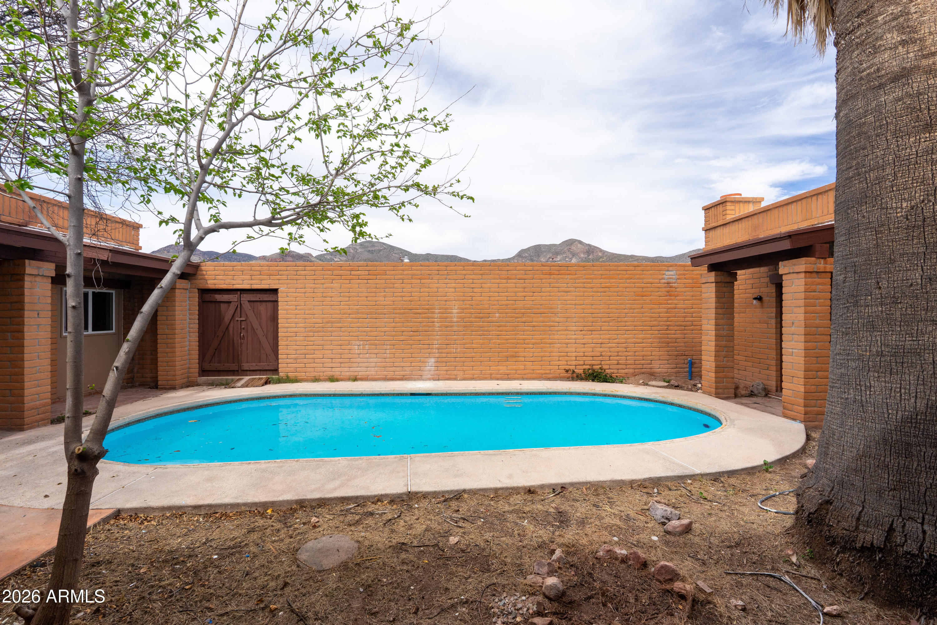 4 Cochise Lane Bisbee, AZ 85603 - Photo 43 of 72 a view of lake with a house in the background