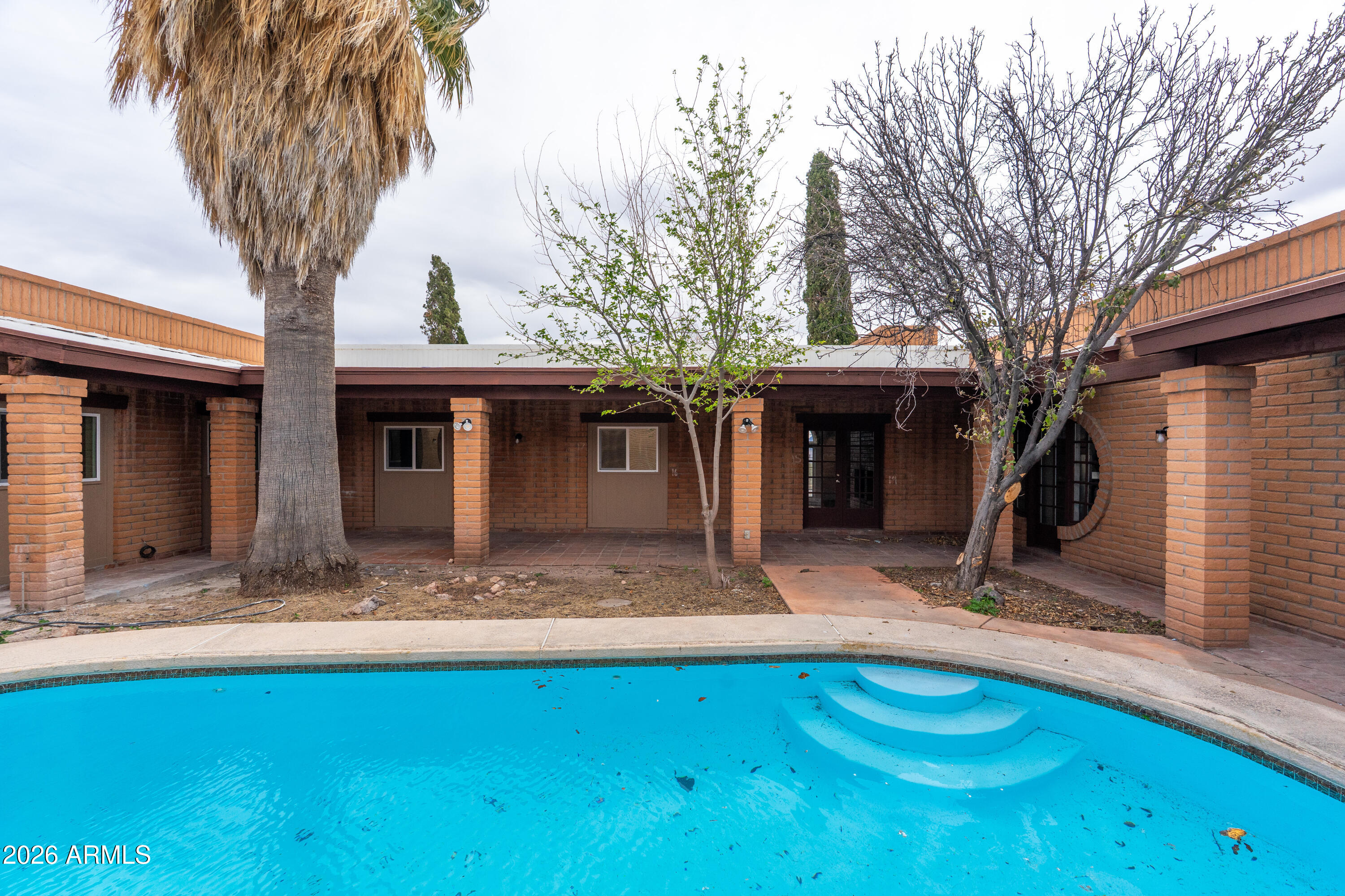 4 Cochise Lane Bisbee, AZ 85603 - Photo 46 of 72 a front view of a house with garden