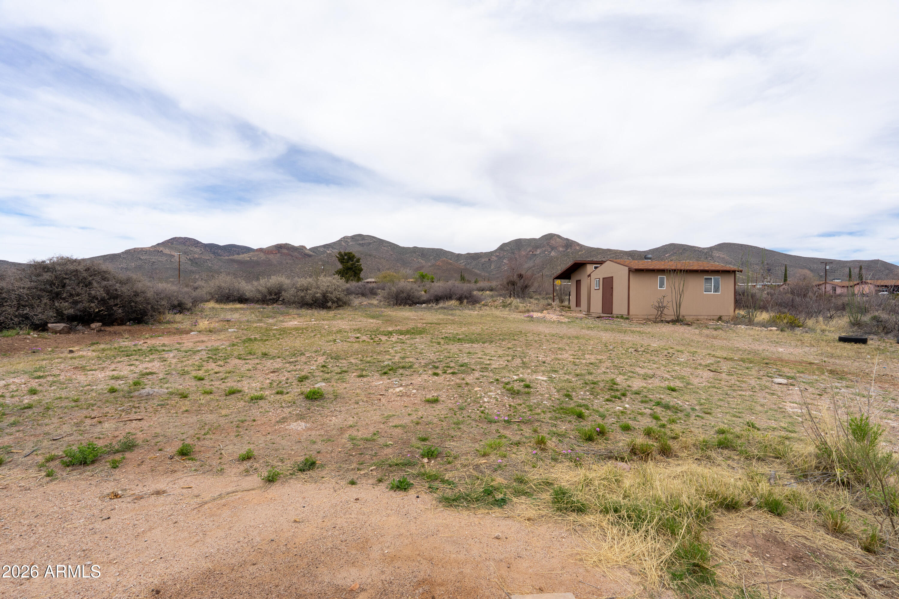 4 Cochise Lane Bisbee, AZ 85603 - Photo 52 of 72 a view of a mountain with wooden fence