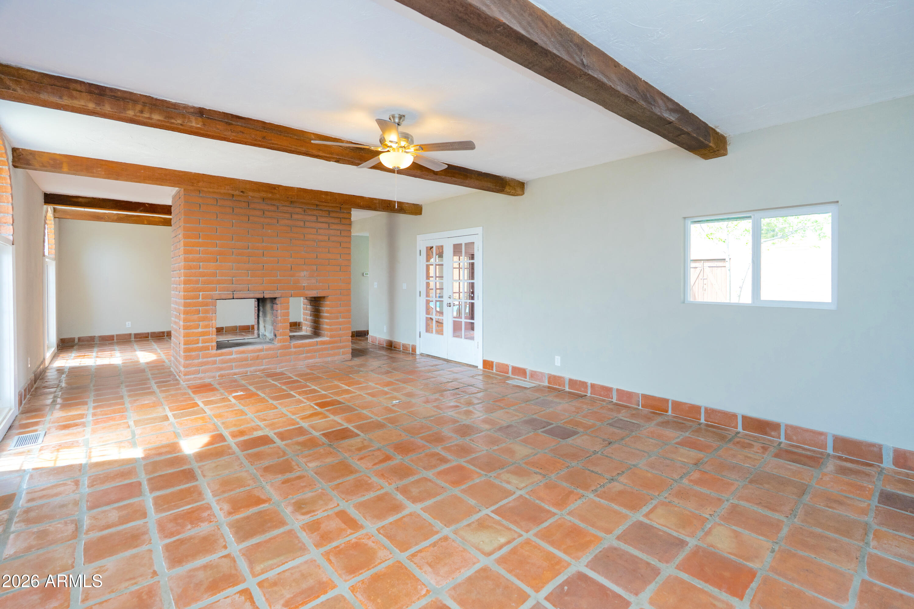 4 Cochise Lane Bisbee, AZ 85603 - Photo 6 of 72 a view of an empty room with a fireplace