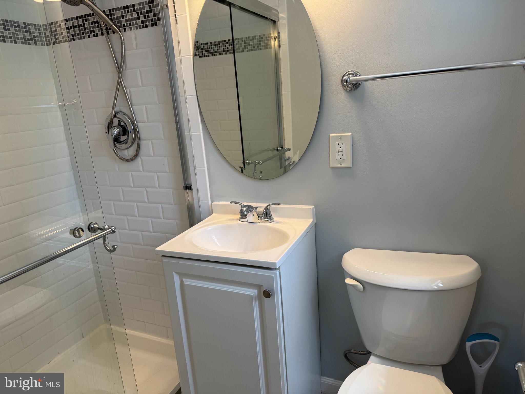 6603 Huntsman Boulevard Springfield, VA 22152 - Photo 25 of 64 Modern bathroom with sleek finishes.