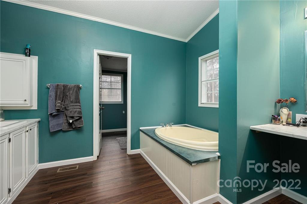 2776 Devine Road Iron Station, NC 28080 - Photo 12 of 23 a room with a bed and a window