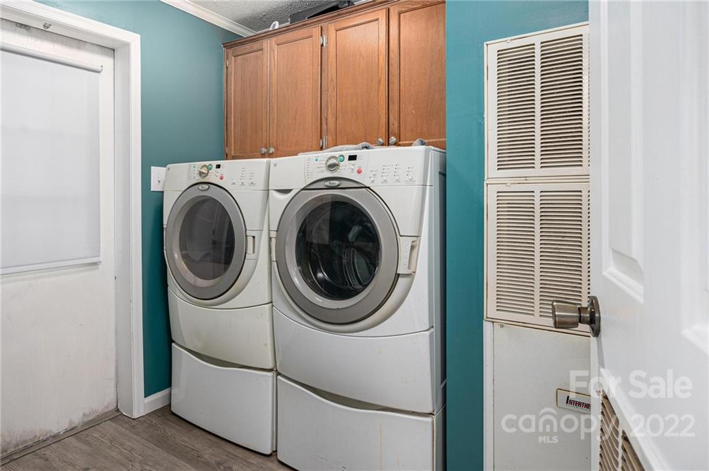 2776 Devine Road Iron Station, NC 28080 - Photo 19 of 23 a utility room with dryer and washer