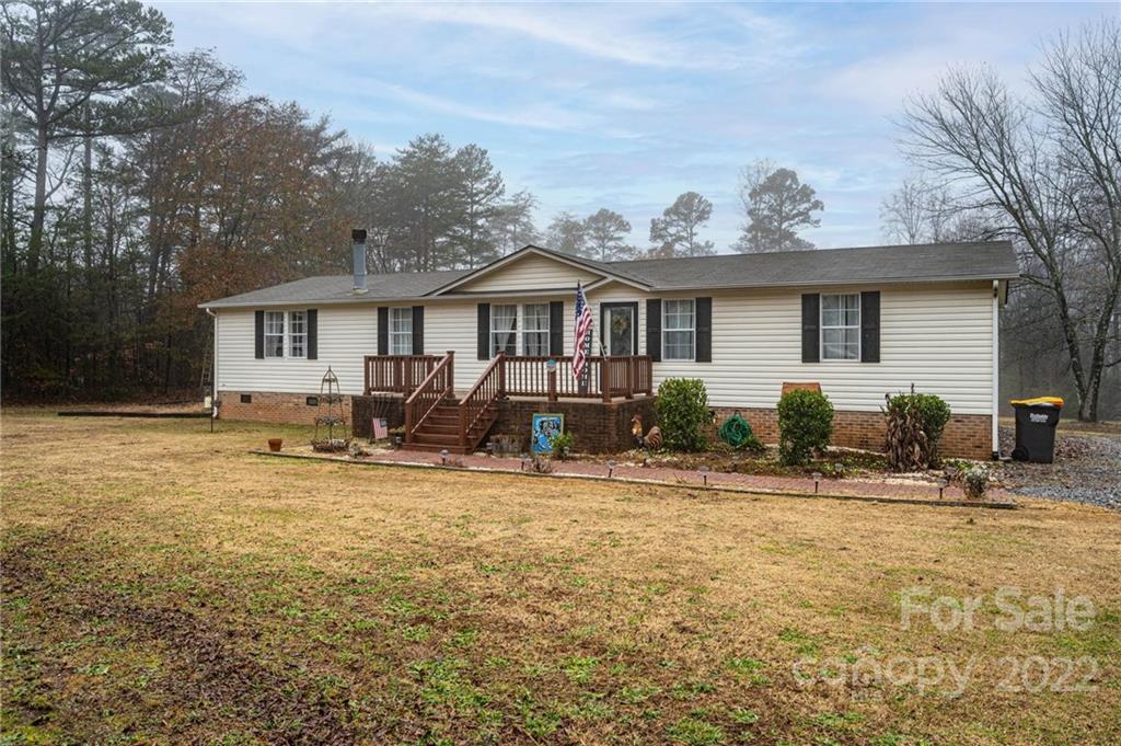 2776 Devine Road Iron Station, NC 28080 - Photo 2 of 23 a view of a house with backyard porch and sitting area