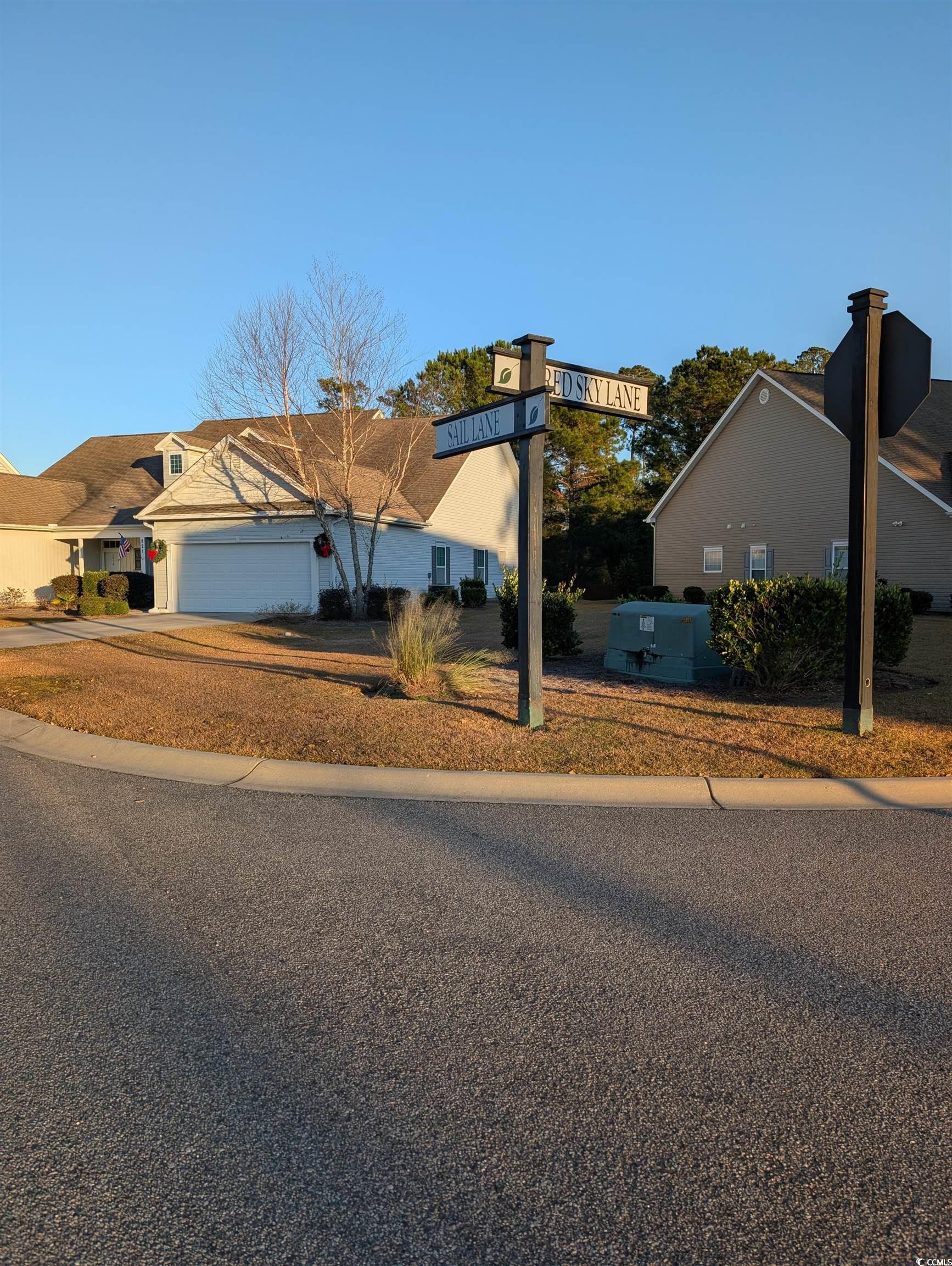 822 Sail Lane Murrells Inlet, SC 29576 - Photo 33 of 34 View of front of house featuring concrete driveway and an attached garage