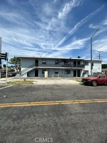 a view of car parked in front of garage