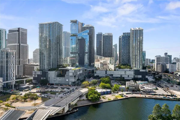 a large body of water with a large building