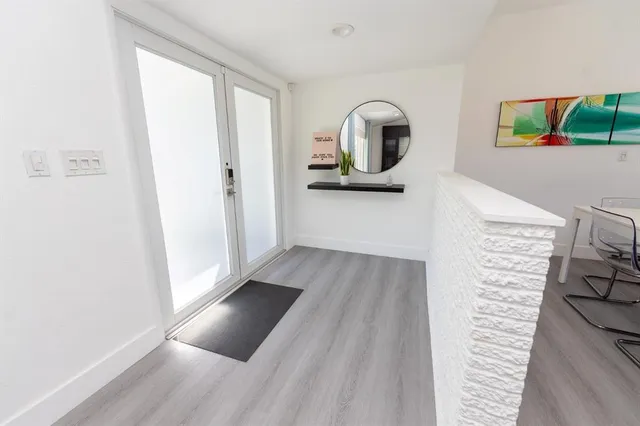a view of livingroom with furniture and window