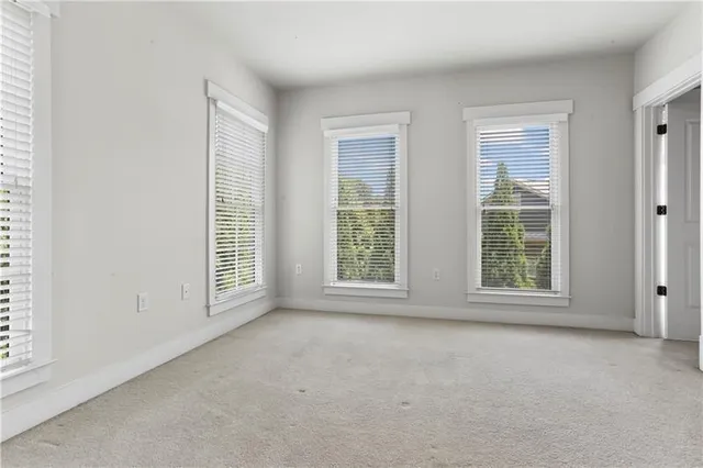 a view of a water fountain in front of a building