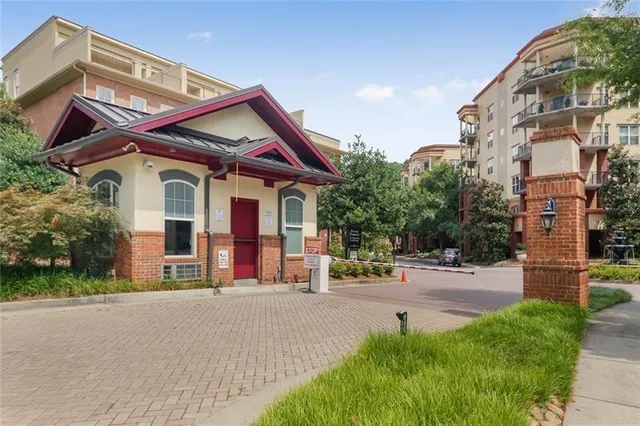 a view of a water fountain in front of a house