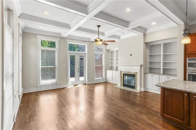 an entryway with fireplace and windows