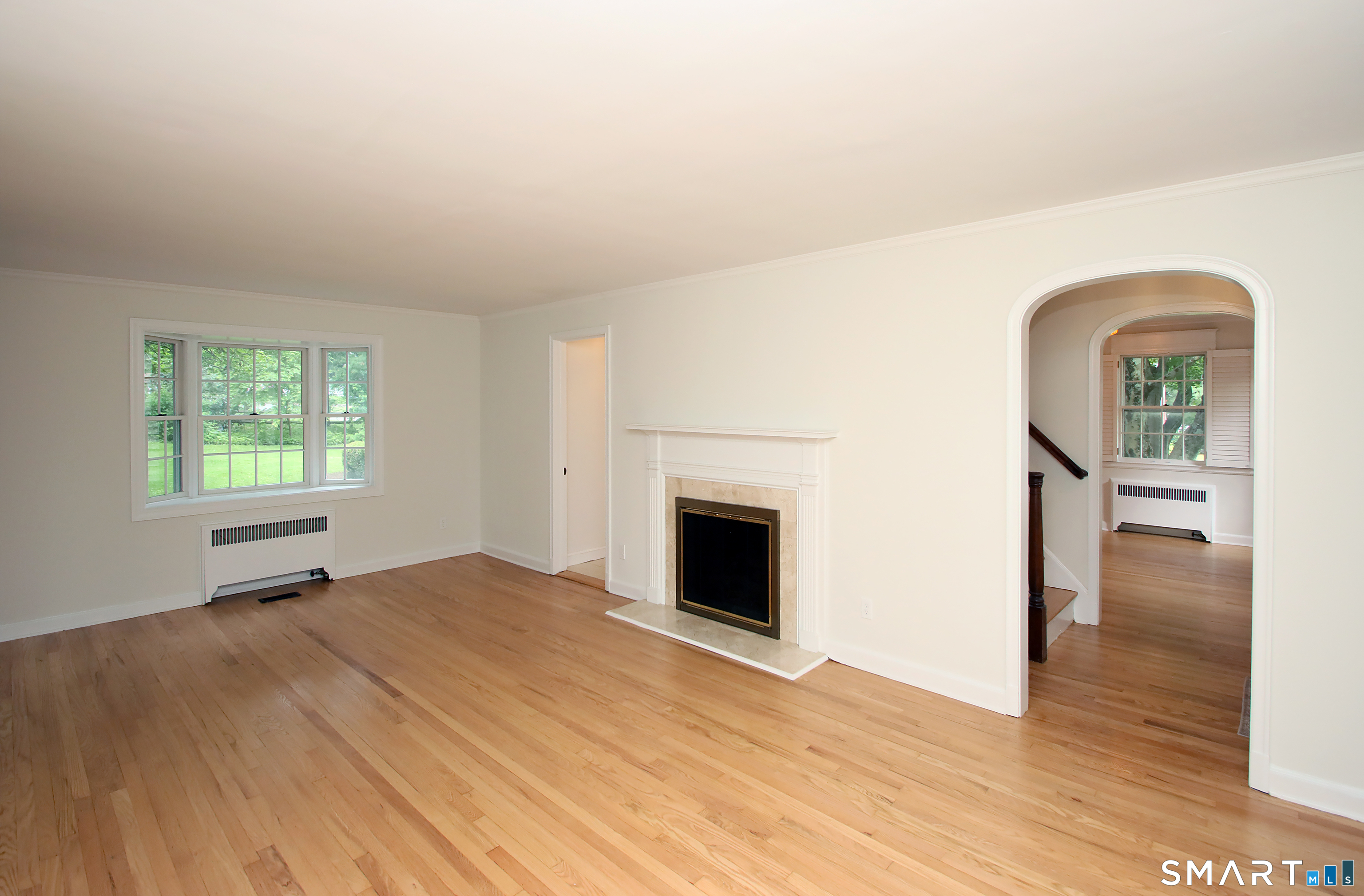 23 Norway Road North Haven, CT 06473 - Photo 8 of 32 a view of empty room with wooden floor and fan