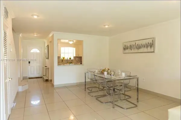 a view of a hallway with seating area