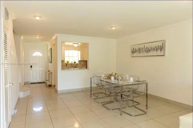 a view of a hallway with seating area