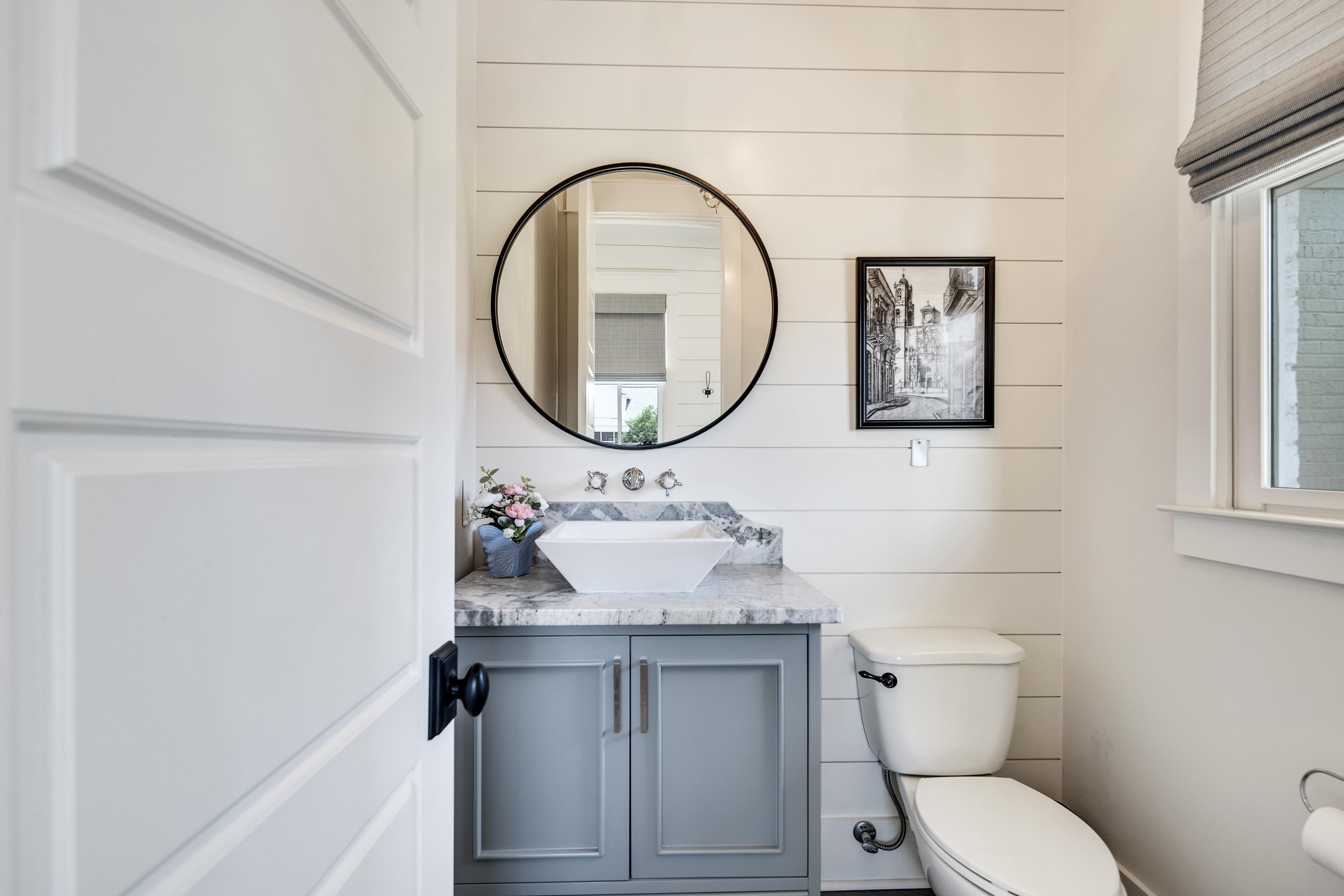 100 Sunflower View Road Piperton, TN 38017 - Photo 15 of 29 Powder room featuring shiplap accent wall, vessel sink, vanity with built-in cabinetry, polished chrome fixtures, and a window with blinds