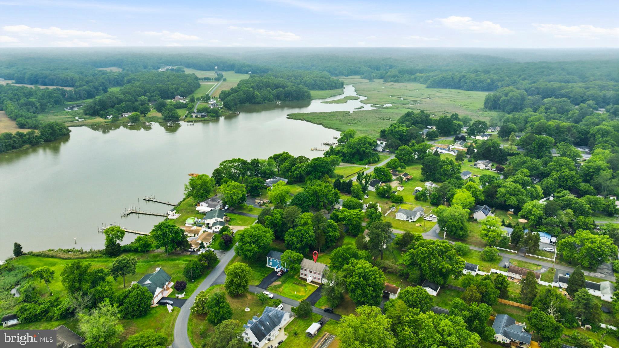 29725 Bruce Road Mechanicsville, MD 20659 - Photo 6 of 79 a view of a lake with a yard