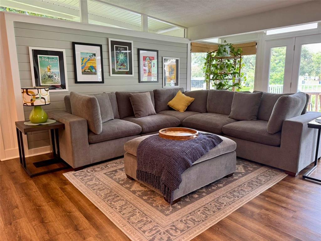 3012 Grand View Avenue Clearwater, FL 33759 - Photo 15 of 43 a living room with furniture and a window